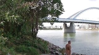 Naked Under The Apollo Bridge In Bratislava, Slovakia